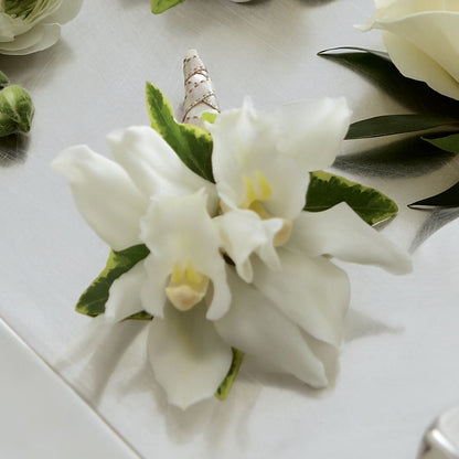 White Mini Cymbidium Boutonniere – MILAM FLORAL & GREENHOUSE, Havre MT
